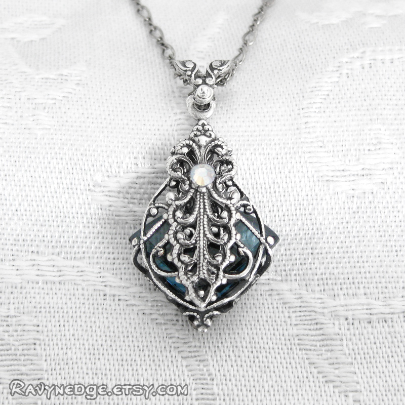 Love Potion No 9 Necklace - Silver Filigree Pendant by RavynEdge.